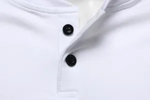 White men's long sleeve T-shirt detail showing classic Henley collar and black button closure.