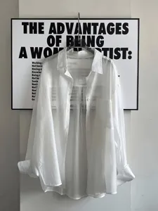 Womens white textured sunscreen shirt cardigan, casual long sleeve button up top with pocket.