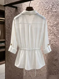 White women lightweight chiffon shirt with cinched waist drawstring and roll-up sleeves.