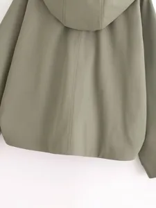 Solid color hooded cloak jacket detail, casual loose outerwear back view for women.