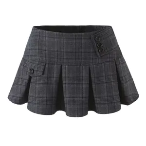 Dark gray plaid pleated mini skirt detail, featuring stylish side buttons and a small pocket.