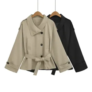 Detailed view of the stylish lapel button short trench coat, highlighting the elegant waist belt.