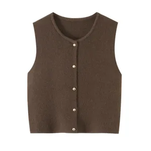 Close-up detail of stylish brown knitted button vest cardigan, soft texture, exquisite buttons.