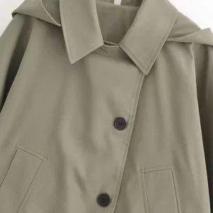 Olive green hooded trench coat for women, stylish cape design with lapel collar and buttons.