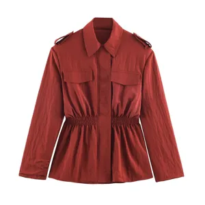 Women red utility jacket with epaulets, chest pockets and elastic waist peplum hem.