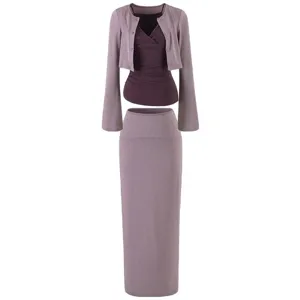 Detailed view of the three-piece knit cardigan, camisole, and long skirt set in mauve.