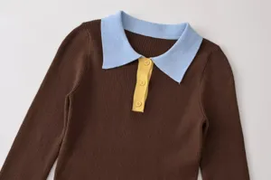 Women long sleeve contrast polo collar ribbed knit sweater detail close up showcase