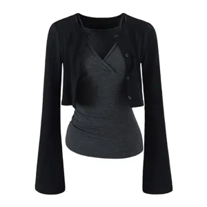 Detailed view of the black knit cardigan and dark grey camisole set, soft texture and chic style.