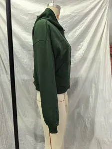 Women's washed dark green zip-up hoodie, casual hooded long sleeve jacket, side view detail.