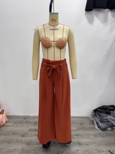 Casual womens corduroy wide-leg pants featuring high waist and stylish tie belt detail.