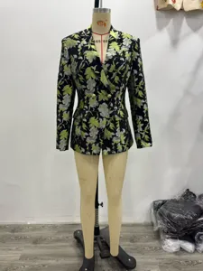 Detailed view of women's floral jacquard blazer with double-breasted gold buttons.