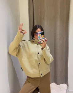 Women's high collar ribbed knit cardigan sweater outerwear, casual commuter style, chic fashion.