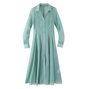 Green V-neck semi-sheer long sleeve shirt dress detail, stylish textured fabric design.
