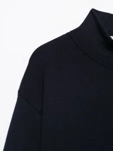 Dark blue mock turtleneck knit sweater detail view, premium fabric texture, casual style.