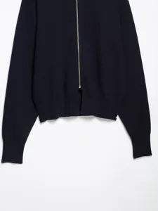 Womens navy blue knit cardigan zipper detail close up stylish winter warm knitwear