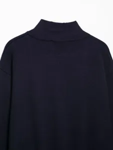 Dark blue mock neck knit sweater detail shot, premium wool blend fabric, stylish apparel.