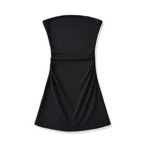 Detailed close-up shot of the black strapless tube top, highlighting the ruched sides and clean hemline.