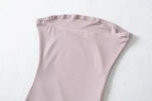 Close-up detail of women ribbed strapless tube top soft knit stretch fabric crop top