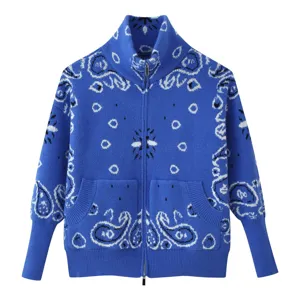 Blue paisley knit zip cardigan detail, stand collar fashion casual sweater close up view.
