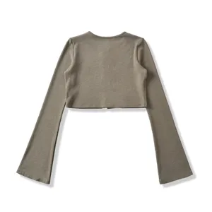Detailed view of women's Korean style solid crew neck cropped long bell sleeve knit top.