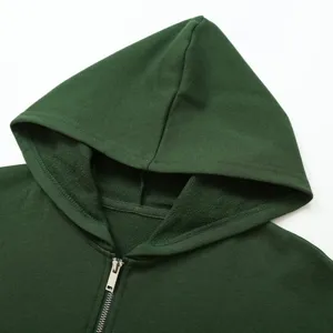 Dark green zip-up hoodie main view showcasing comfortable fabric and metallic zipper details.