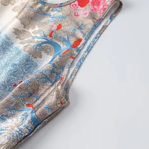 Detail shot of women's stylish printed sleeveless top with elegant artistic floral pattern.