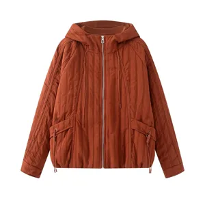 Women's hooded quilted zip-up jacket in terracotta, featuring vertical stitching and pockets.