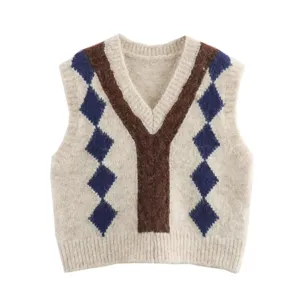 Elegante chaleco de punto con patrón de rombos, cuello en V y detalles en contraste.