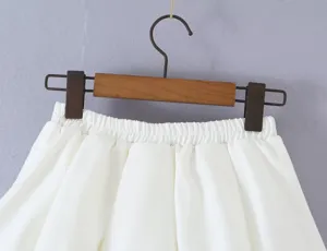 White fluffy bubble mini skirt for women, elegant casual high waist short skirt details.