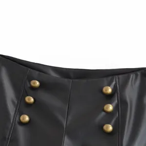 Women's high waist black faux leather shorts with vintage gold-tone double-breasted metal buttons.