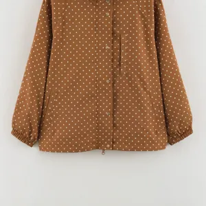 Stylish brown polka dot hooded windbreaker jacket for women, perfect for daily commute and casual wear.