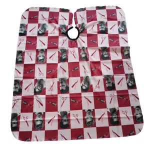 Professionele kapperscape met klassiek rood-wit ruitjespatroon en kappersgereedschap.