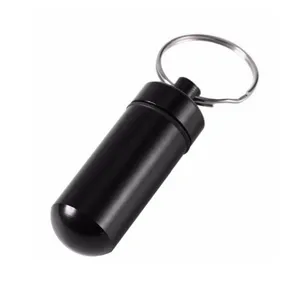 Portable aluminum alloy mini pill bottle keychain detail, lightweight outdoor container.