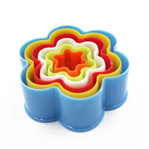 Plastic flower baking mold set, nested cookie cutters for cake and vegetable cutting.