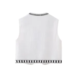 White sleeveless vest for women with black embroidered trim stylish casual top fashion.