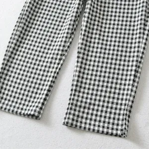 Black and white checkered casual pants for women, retro elastic slim fit capri trousers.