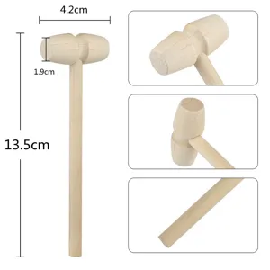 Detailed view of the mini wooden hammer showing natural wood texture, smooth head and handle.