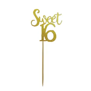 Gold glitter Sweet 16 cake topper close up detail for birthday party cake table decoration.