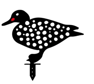 Acrylic duck yard art detail showing polka dot cutout pattern and garden stake design.