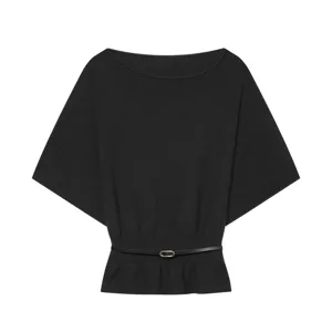 Detail view of women solid color knit top featuring batwing sleeves and elegant waist belt.