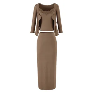 Knitted cardigan, lace camisole, and high-waist maxi skirt set for women, chic fall outfit.