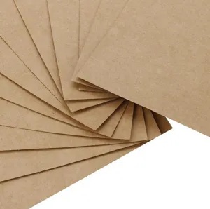 Detailed view of brown kraft paper sheets fan-arranged, ideal for DIY crafts and card making.