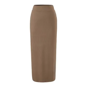 Brown ribbed knit maxi skirt detail, high waist bodycon design, elegant knitwear close-up.