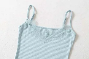 Light blue ribbed knit camisole with delicate lace V-neck detail and adjustable straps.