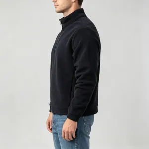 Detail view of men's solid color half-zip fleece sweatshirt, stand-up collar and cozy texture.