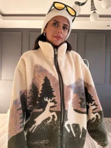 Close-up detail of the cozy fleece zip cardigan featuring scenic forest and deer print.