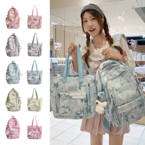 Detailed view of the stylish floral print canvas backpack and tote bag set showcased.