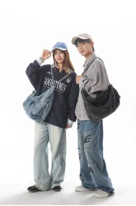 Fashionable denim shoulder bag, casual large capacity cross body bag for daily travel and outdoor use.