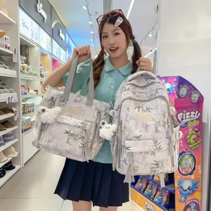 New Chinese style printed canvas backpack and tote bag set with cute fluffy plush pendant.