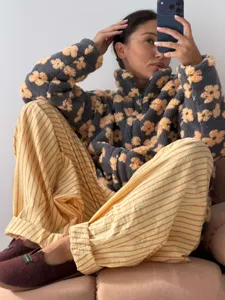 Casual fleece zip-up jacket with floral print, loose fit autumn winter fashion top.